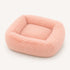 Coussin apaisant rectangulaire pour chat en tissu ultra moelleux rose, présenté sur fond neutre en studio.