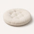 Coussin pour panier pour chat beige en tissu bouclette ultra doux, présenté sur fond neutre avec rembourrage moelleux et finition confortable.