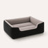 Grand panier chat noir avec interieur gris ultra doux et rebords confortables, photographie produit sur fond clair style e-commerce