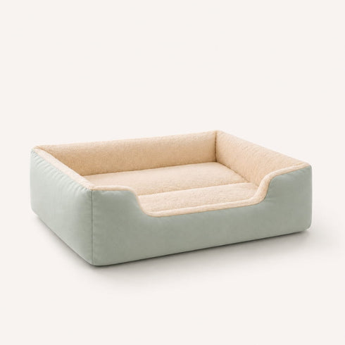 Grand panier chat vert clair avec interieur creme ultra doux et rebords confortables, photographie produit sur fond clair style e-commerce