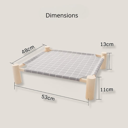 Schéma des dimensions du hamac pour chat sur pied en bois clair avec toile grise, indiquant les mesures complètes du couchage et de la hauteur.
