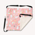Hamac suspendu pour chat en tissu rose à motifs avec doublure polaire blanche, idéal pour un couchage doux et chaleureux.