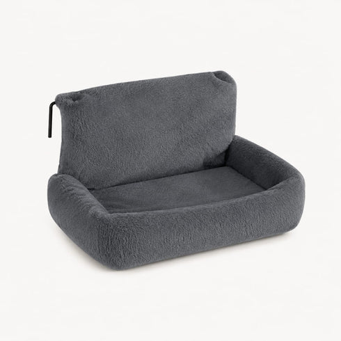 Lit radiateur pour chat en peluche gris foncé avec rebords moelleux, conçu pour offrir un couchage chaud et confortable en hiver.