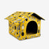 Niche pour chat extérieur hiver jaune à motifs, vue studio sur fond blanc.