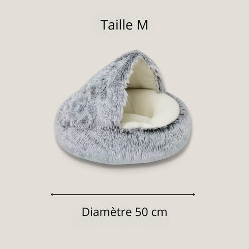 Nid pour chat en fausse fourrure grise, modèle taille M de 50 cm de diamètre, présenté sur fond beige.