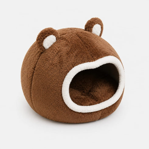 Panier boule marron pour chat avec texture ultra douce, ouverture arrondie et coussin intérieur confortable sur fond neutre studio