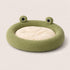 Panier pour chat Chat Cocooning en peluche verte avec coussin beige, forme ronde originale avec yeux décoratifs, idéal pour un coin cosy au salon.
