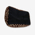 Dessous du panier pour chat XXL avec base noire et contours motif girafe, présenté sur fond blanc.