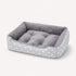 Panier chaud pour chat gris à motifs avec coussin gris ultra moelleux et rebords rembourrés pour un confort optimal.