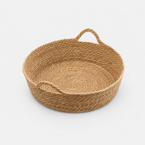 Panier rond osier chat vide en imitation osier avec poignées intégrées, style naturel et minimaliste sur fond neutre.