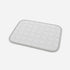 Tapis de refroidissement pour chat gris clair avec surface matelassée respirante conçu pour apporter fraîcheur et confort pendant les journées chaudes